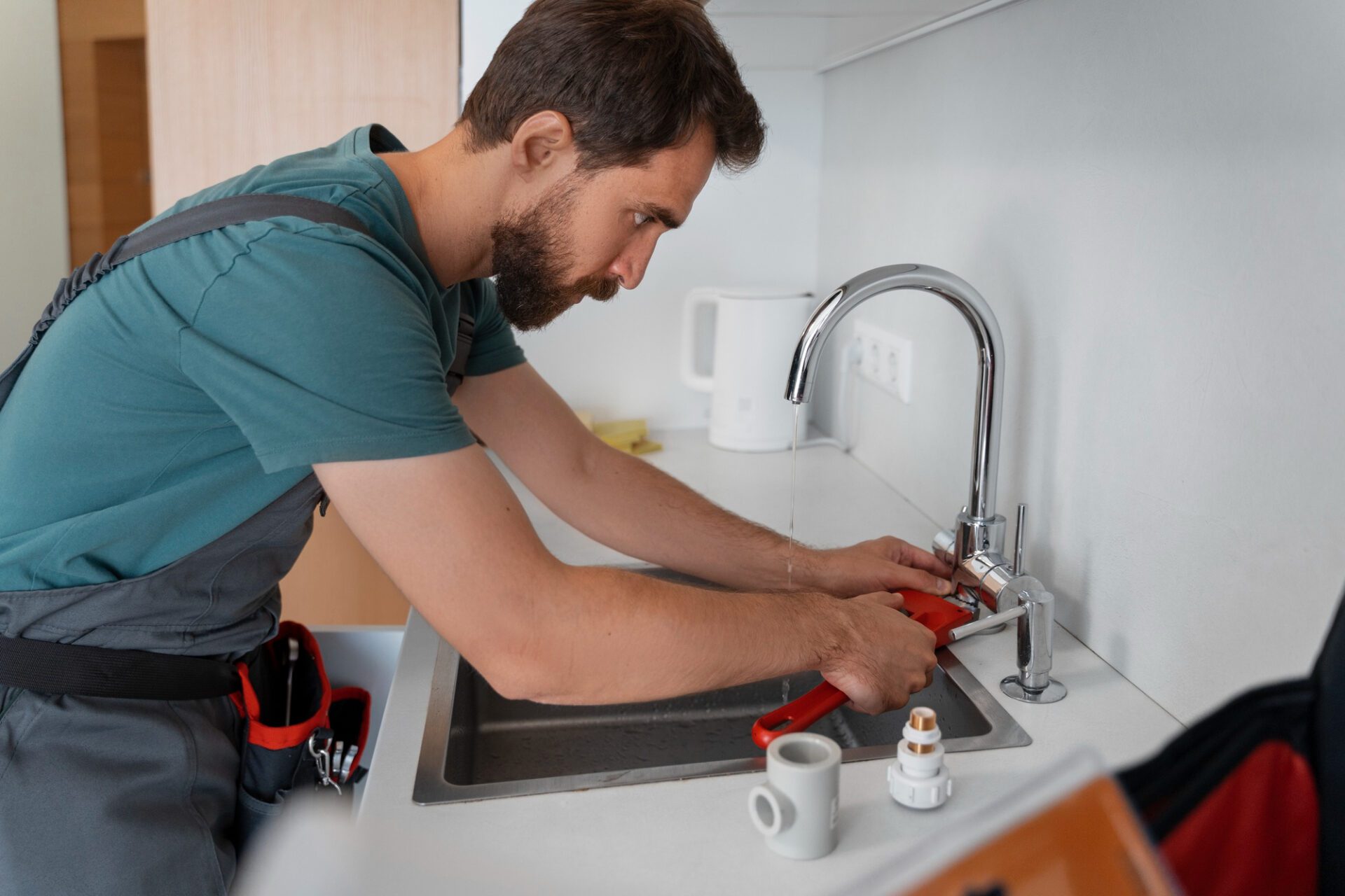 Side view man working as plumber